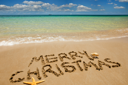 merry Christmas written in sand